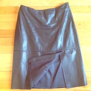 Sexy black leather skirt with slit in the front.